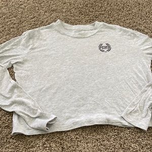 Pink long sleeve shirt.